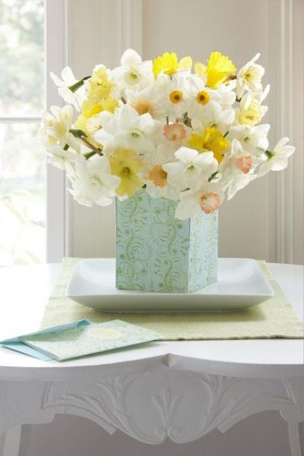 a refined spring centerpiece of a vase on a tray and lots of daffodils is a great idea for spring decor