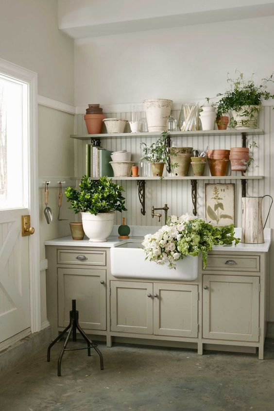 vintage kitchen cabinets used ina  garden shed for storage and for garden works, plus open shelves