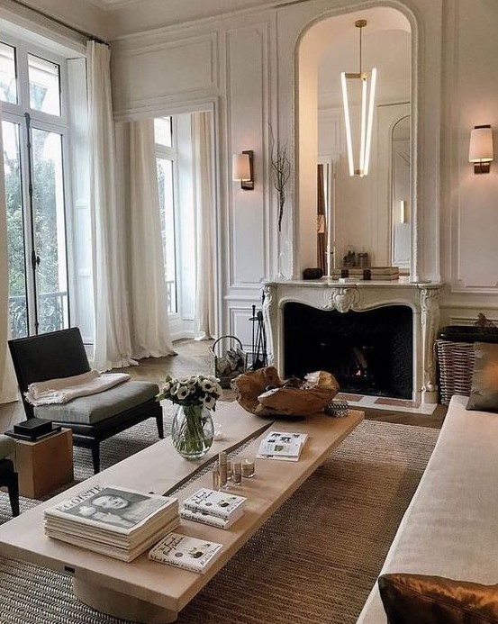 A French style living room done in neutrals   off white, ocher, light greys and jsut some touches of dark shades