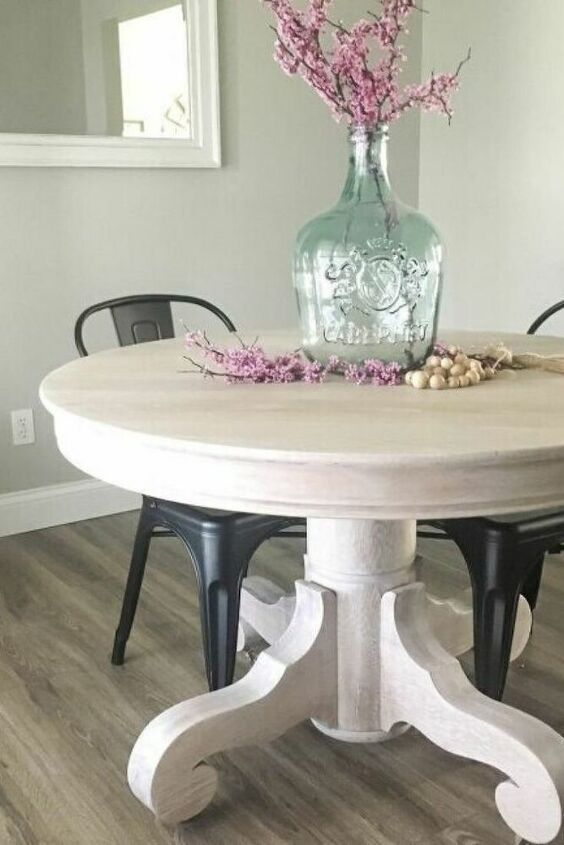 a large vintage whitewashed dining table with refined legs is a lovely idea for a shabby chic or farmhouse interior and it looks chic