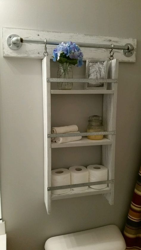 a small whitewashes hanging open shelf is a cool idea for a bathroom or any other small space in your home