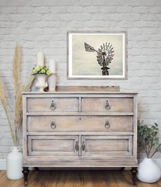 a vintage whitewashed sideboard on dark stained legs is a lovely idea for a beautiful and inspiring Scandi space