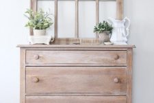 a whitewashed sideboard with a screen is a lovely idea for a coastal or beach cottage or for just a hsbaby chic space