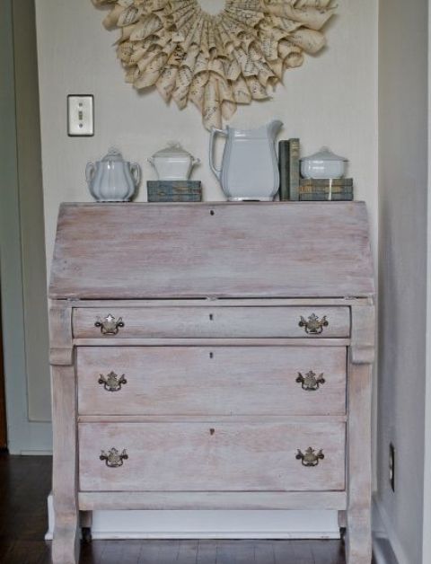 a whitewashed vintage storage unit on casters and with vintage pulls is a lovely idea for a chic dining room or entryway