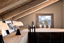 a practical attic bathroom design with lots of wood