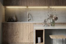 a minimalist plywood kitchen with sleek cabinets, a concrete backsplash and countertops plus a concrete kitchen island