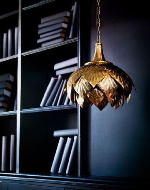 a gold flower-shaped pendant lamp is a refined and chic addition to any interior