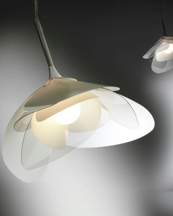 a gorgeous flower-shaped pendant lamp with acrylic petals will match a modern space and will give it a natural feel