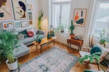 a mustard chair, bright artworks and potted plants here and there will make your living room feel like summer