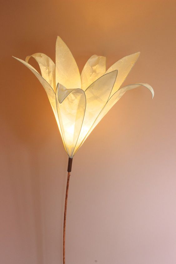 a simple flower-shaped neutral lamp like this one will unobtrusively make your interior more nature-infused