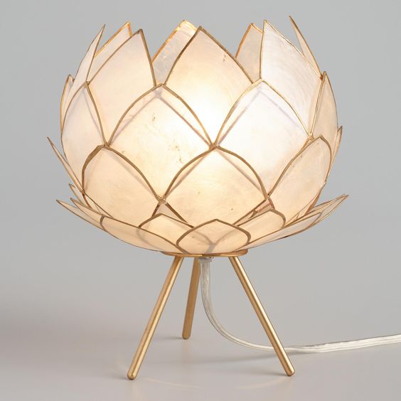 a super elegant neutral flower-shaped table lamp with a gold edge will bring chic to your space