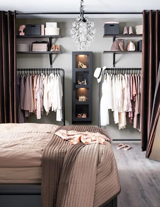 hide your closet in the bedroom behind curtains and make it invisible whenever you want