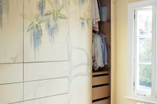 style your wardrobe with a mural, so it will be part of decor and it will fulfill its storage functions at its best
