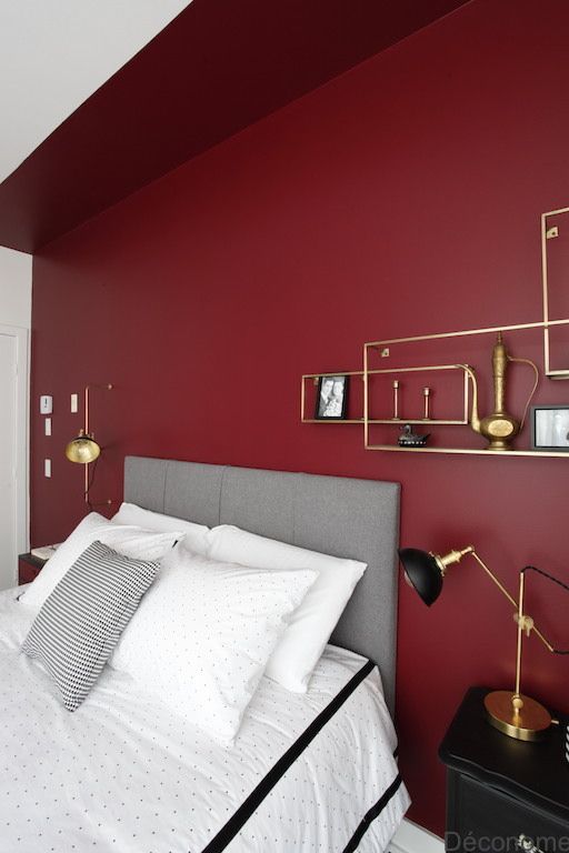 a burgundy statement wall is a bold idea for a bedroom and it's actual not only in the fall
