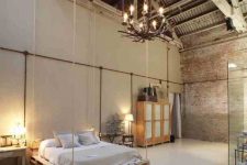 a stylish neutral industrial bedroom