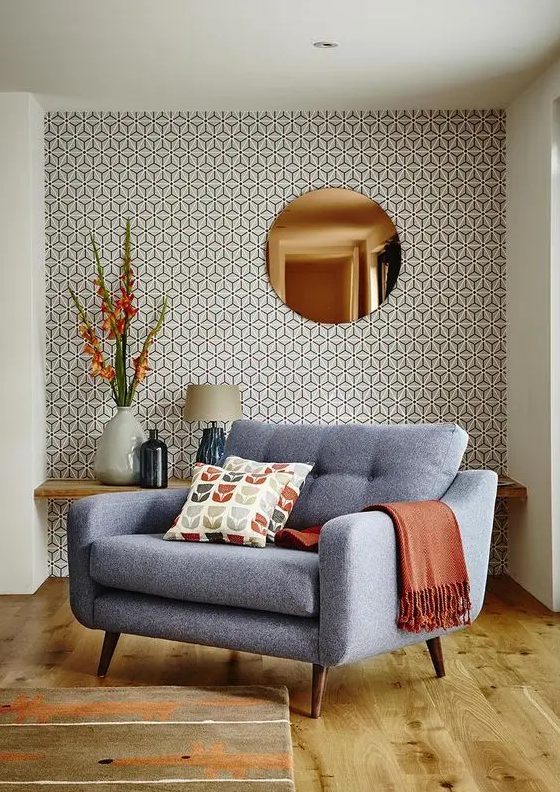 Classic geometric print wallpaper is ideal for a mid century modern living room and adds interest to it