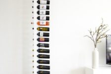 a white vertical rack for wine bottles is very cool and won’t take much space in your dwelling