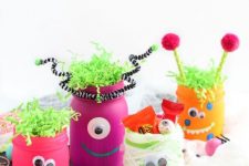 neon monster jars with googly eyes are amazing for kids’ Halloween parties and you can DIY them