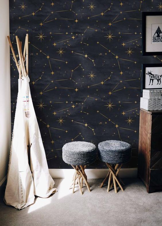 a celestial black and gold wall mural is a fantastic idea to renovate a space, it's trendy and very whimsy