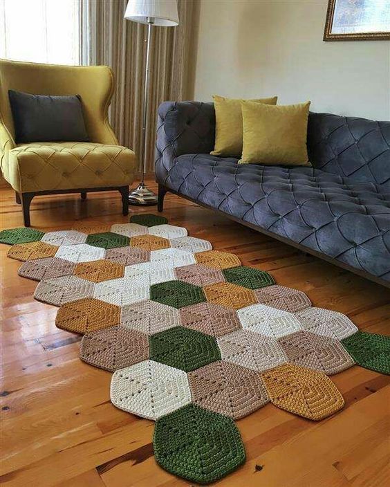 A colorful hexagon crochet rug is a perfect solution for a mid century modern living room and it will add color and pattern to the space
