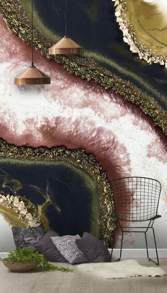 a fantastic bold geode wall mural in dark green, black, gold, pink and white looks very refined