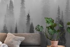 a moody forest wall mural harmonizes the space and makes it more relaxing yet very eye-catching at the same time