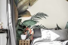 a neutral bedroom is totalyl changed with a bold tropical wall mural that creates a mood in the space