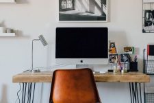 an industrial home office with a stylish desk – with hairpin legs and a wooden desktop is a cool idea for many home offices