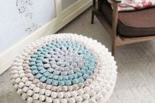 make your simple stool colorful and very soft covering it with a pretty and bright crochet piece like here