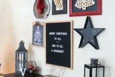 a bold industrial Christmas gallery wall with marquees, signs, artworks, a cardboard deer head and chalkboards