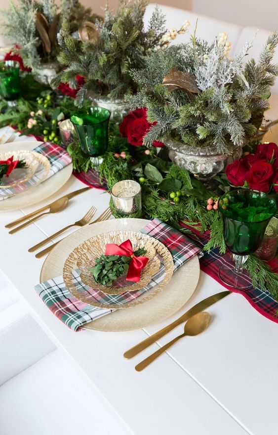 a stylish christmas tablescape with plaid linens