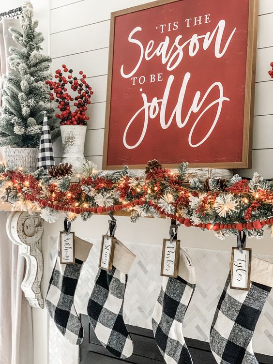 A classic red Christmas sign with white calligraphy is always a good idea for most of farmhouse inspried interiors