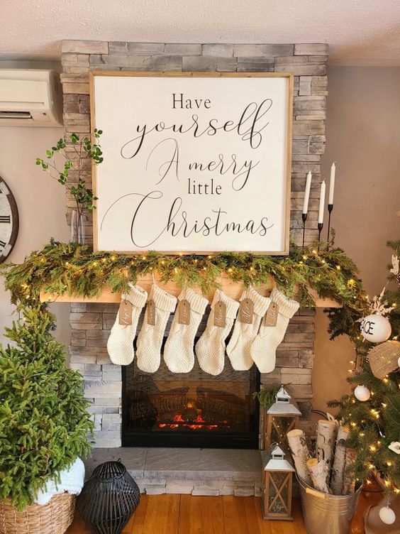 A cool calligraphy Christmas sign with a light stained frame is a lovely idea for both indoors and outdoors