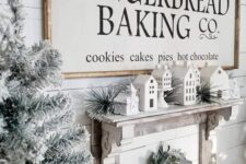 a large farmhouse Christmas sign with black letters is a lovely idea for a farmhouse or rustic home