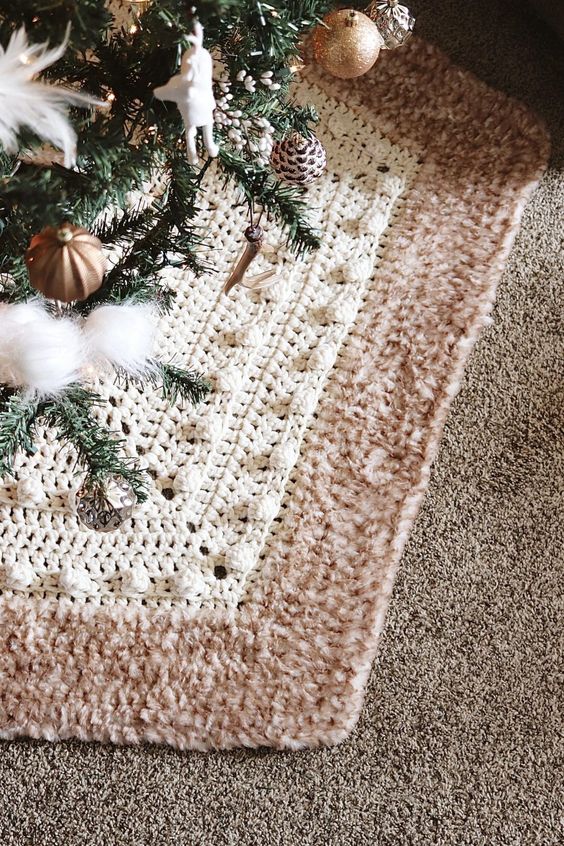 a stylish white and tan knit hexagon tree skirt like this one will make your tree more elegant and chic