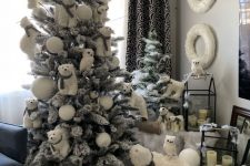 a whimsical Christmas tree with bears, snowballs, owls and deer is a veyr creative idea to excite your kids