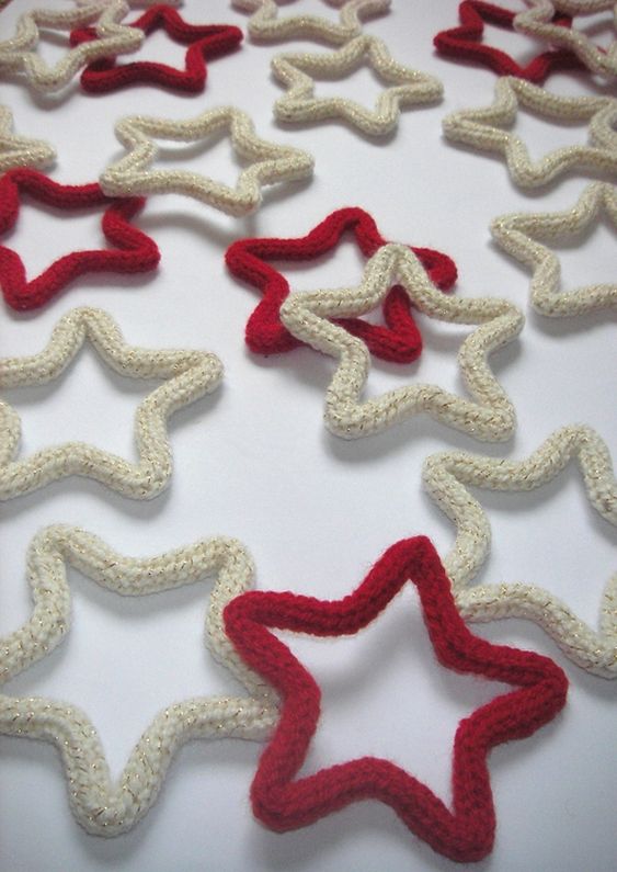 white and red stars covered with knits are great for creating a holiday feel in the space and will catch an eye for sure