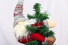 a fun elf in a tall hat Christmas tree topper done in grey, red and white is a super fun and creative idea
