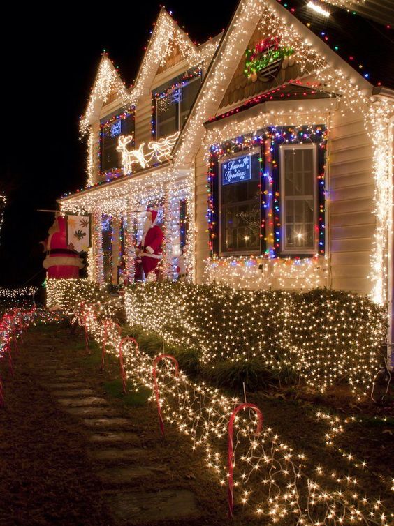 Lights covering the whole house, lining up the path and some figurines made of lights make this house absolutely gorgeous and Christmas ready