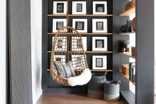 a nook with built-in wooden ledges that perfect for displaying any photos and pics