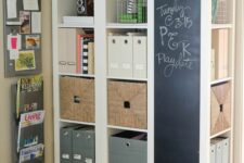 an oversized storage unit with a chalkboard surfaces is a great idea to rock in your home office, get inspired