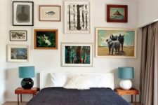 a colorful mid-century modern bedroom with a bright geometric rug, a bed, laconic nightstands and an eclectic gallery wall