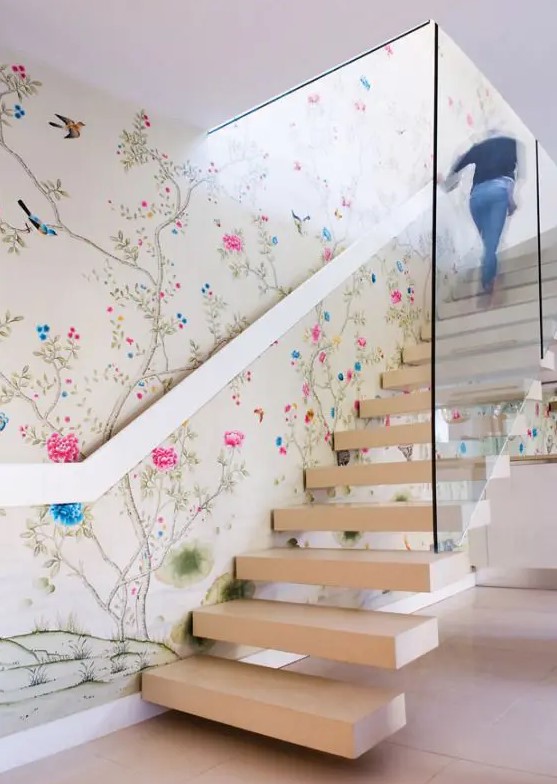 chinoiserie-inspired floral wallpaper and neutral stairs that stand out