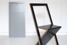 a black minimalist folding chair is a cool idea for any small modern space