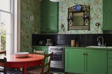 a cute kitchen design with a floral wallpaper