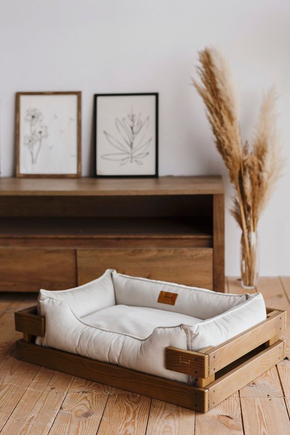 a crate bed with an additional soft bed on top is a lovely idea for a rustic or boho interior and you can DIY that