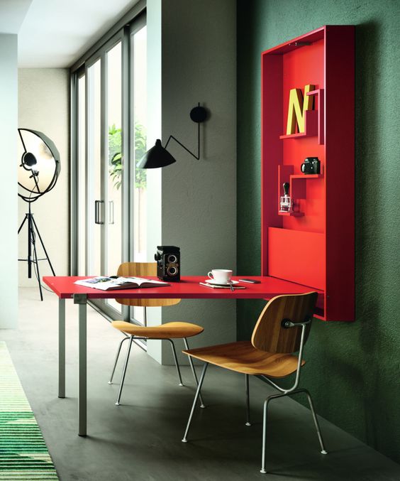 a hot red folding desk or dining space with some shelves inside is a cool option for a small space