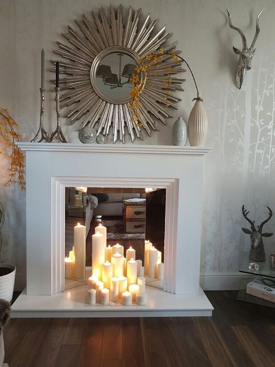 if you place some mirrors in the fireplace, the light will be reflected
