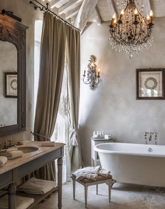 Off white and grey tones for a peaceful bathroom, and a wooden ceiling and draperies add a textural look