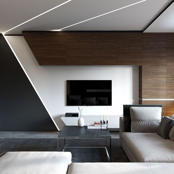 a bold minimalist living room with dark stained wood, geometric touches, a sectional sofa and built-in lights for a futuristic feel